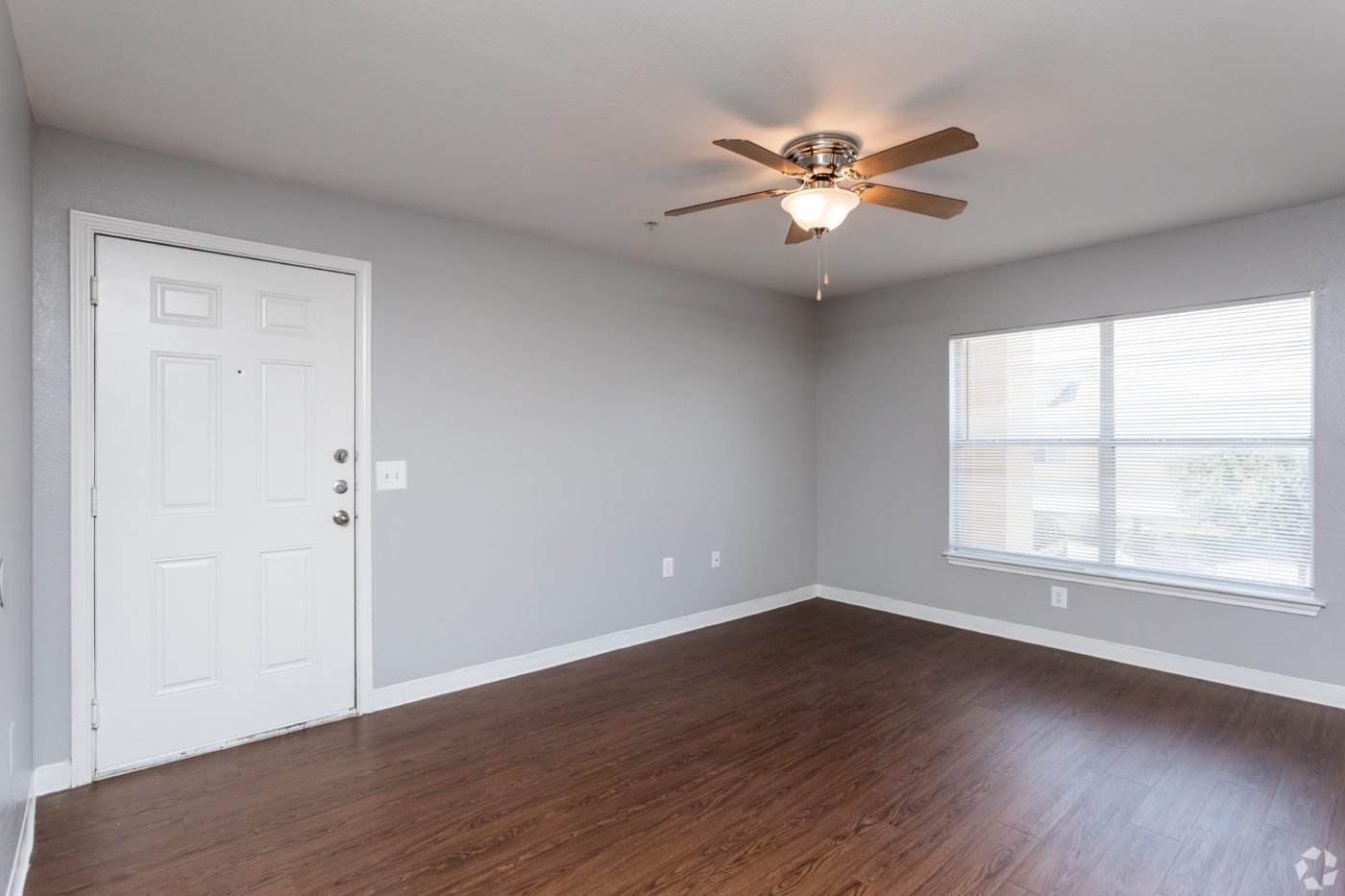 2BR-2BA-901-SF-Living-Room-honey-brown-floors-grey-paint-14-scaled - Cable Ranch Apartments