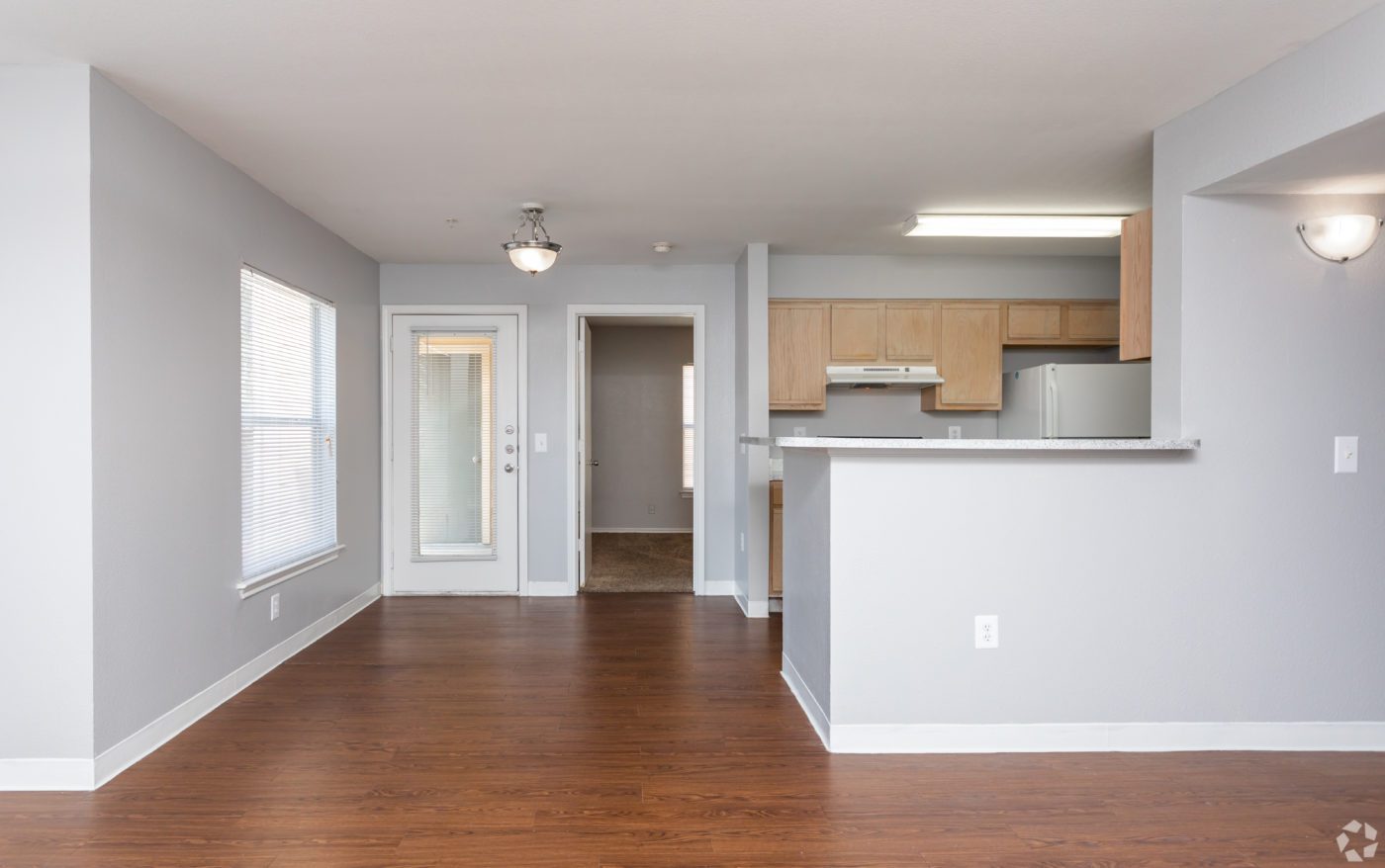 2BR-2Ba-901-SF-Dining-Room-honey-floor-light-cabinets-scaled - Cable Ranch Apartments